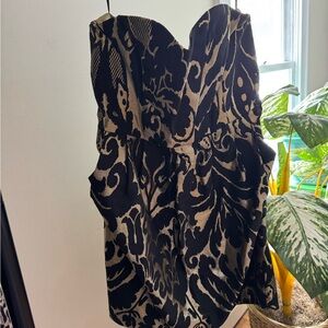 H&M Black and Gold Patterned mini dress with pockets